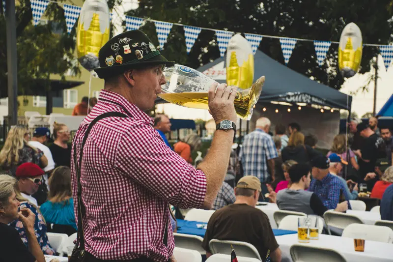 man drinking beer street festival Germany