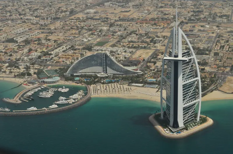  Visitors enjoying Jumeirah Beach with Burj Al Arab in background