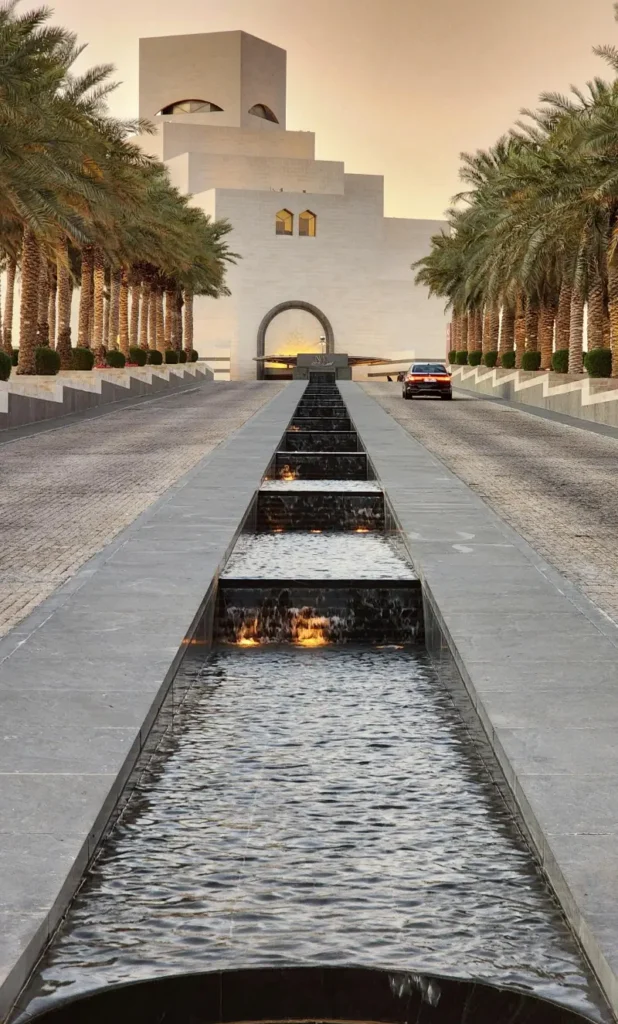 Exterior view of the Museum of Islamic Art in Doha, Qatar with modern architecture and waterfront