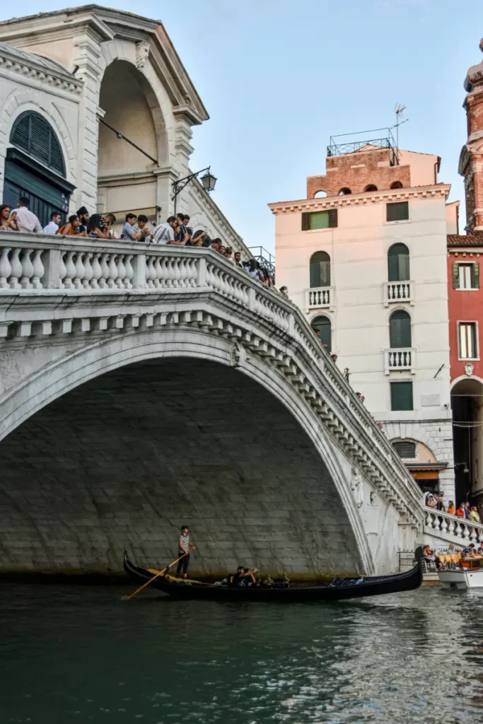 Venice gondole and people on the bridge